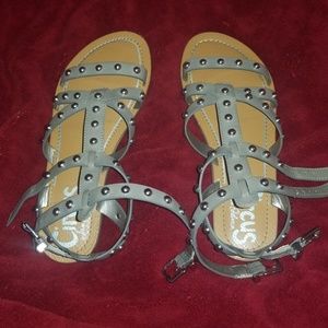 Gladiator gray sandals with silver studs